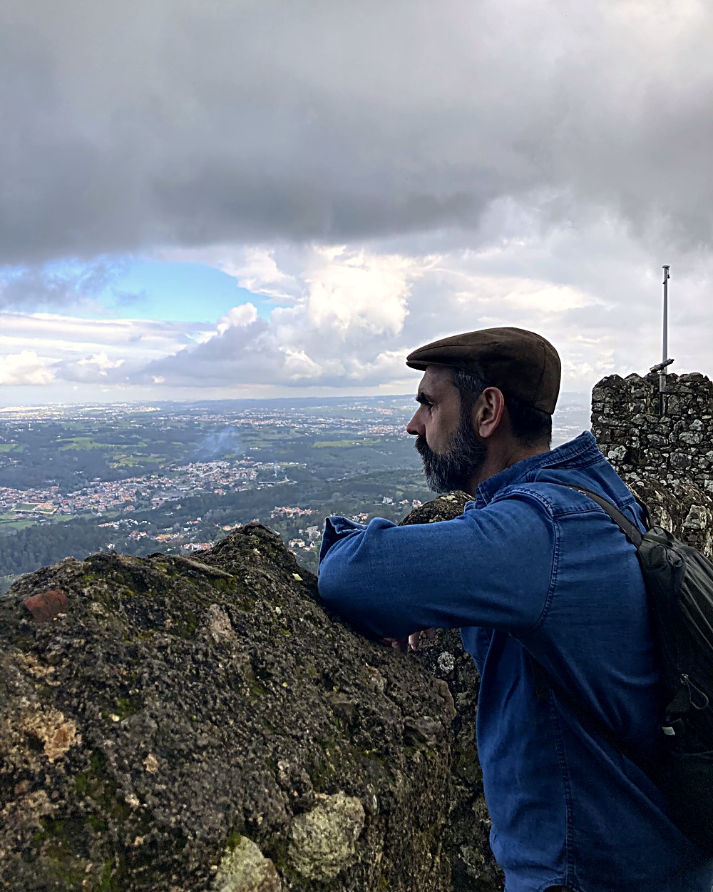 Jim Delaney looking out over a valley from a hilltop